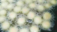 Floating gulab jamun balls in ghee for gulab jamun recipe
