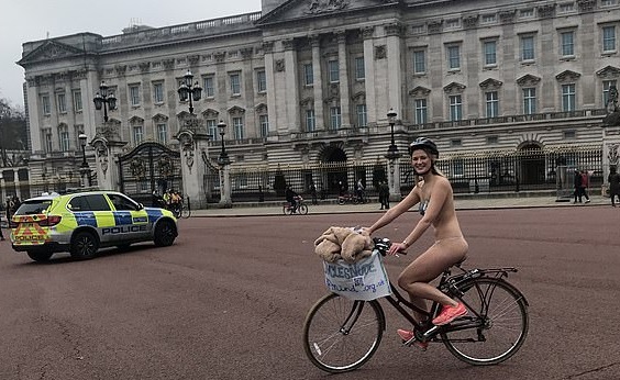 Woman cycles around London without clothes to raise money for mental health charities