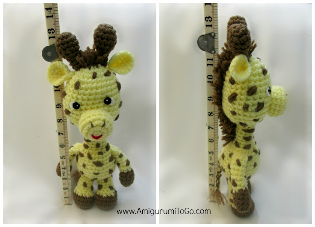 amigurumi giraffe standing next to ruler