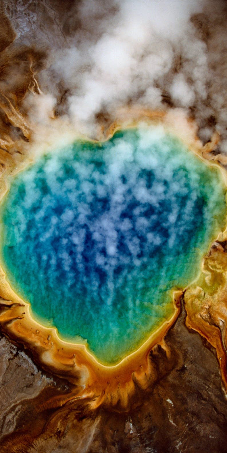 Grand Prismatic Spring in Yellowstone National Park, Wyoming and 50+ Secret Places in America That Most Tourists Don't Know About Grand Prismatic Spring in Yellowstone National Park, Wyoming and 50+ Secret Places in America That Most Tourists Don't Know About