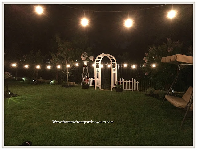 Backyard Landscape-Windmill-Cottage Garden-Farmhouse Style-Garden Lights-White picket fence- White Garden Arbor-From My Front Porch To Yours