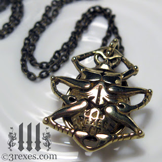 brass scarab beetle with chain