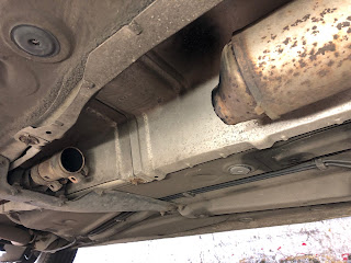 VW Golf rusted exhaust pipe cut out from catalytic converter