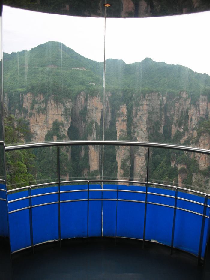 Bailong Elevator built into the side of a huge cliff. Also known as Hundred Dragons Elevator, this glass elevator stands 330 meters tall and is claimed to be the highest and heaviest outdoor elevator in the world. Quite possibly, it is the only elevator in the world that lets people ride up a cliff.
