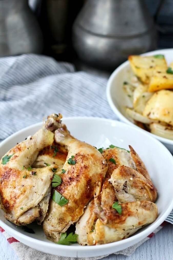 Sheet pan chicken with potatoes in a bowl