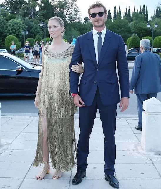 Beatrice Borromeo wore a golden fringed gown and headpiece from Christian Dior. Buccellati Milan earrings and bracelet