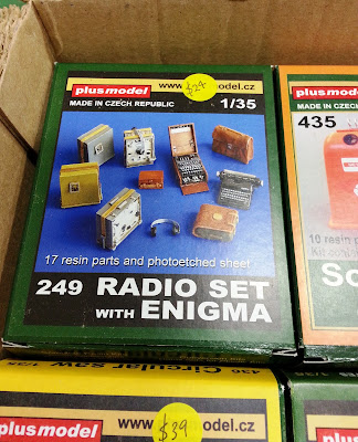 A 1/35 scale radio set on display on a stand at a scale model exhibition.