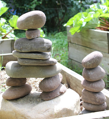stacked stones in a garden
