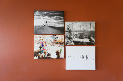 4 canvases on a wall