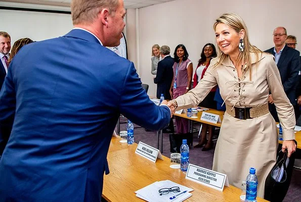 Queen Maxima wore a Polo Ralph Lauren lace-up cotton poplin dress, Gianvito Rossi sandals, and carried Marina Raphael bag