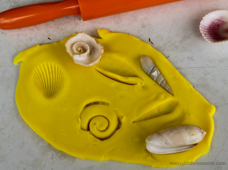 Playdough Seashell Fossils Activity - Messy Little Monster
