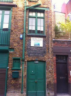 Ghost sign, Brownlow Mews, London