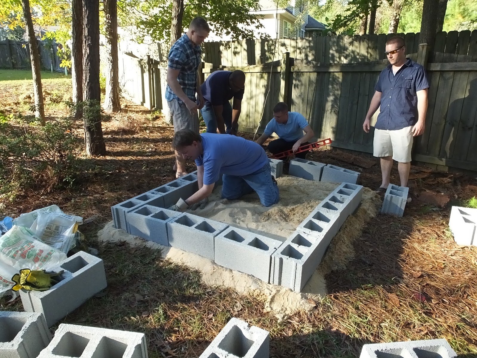Ox and Brock How to Build a Pit and Cook a Whole Pig Like a Champion