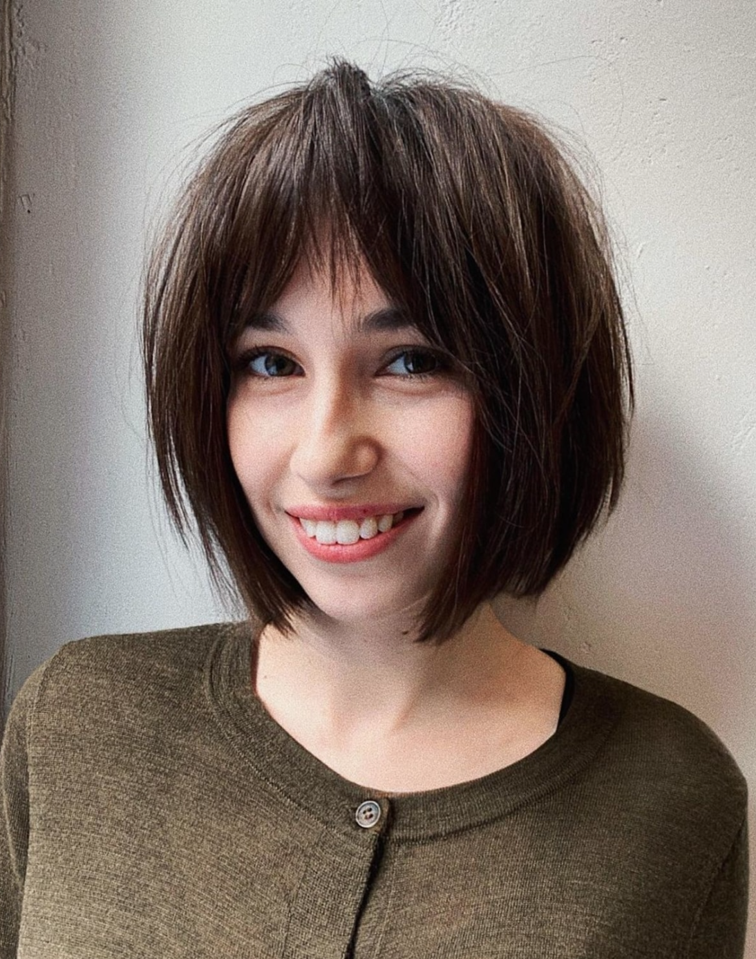 Short hair with curtain bangs and layers