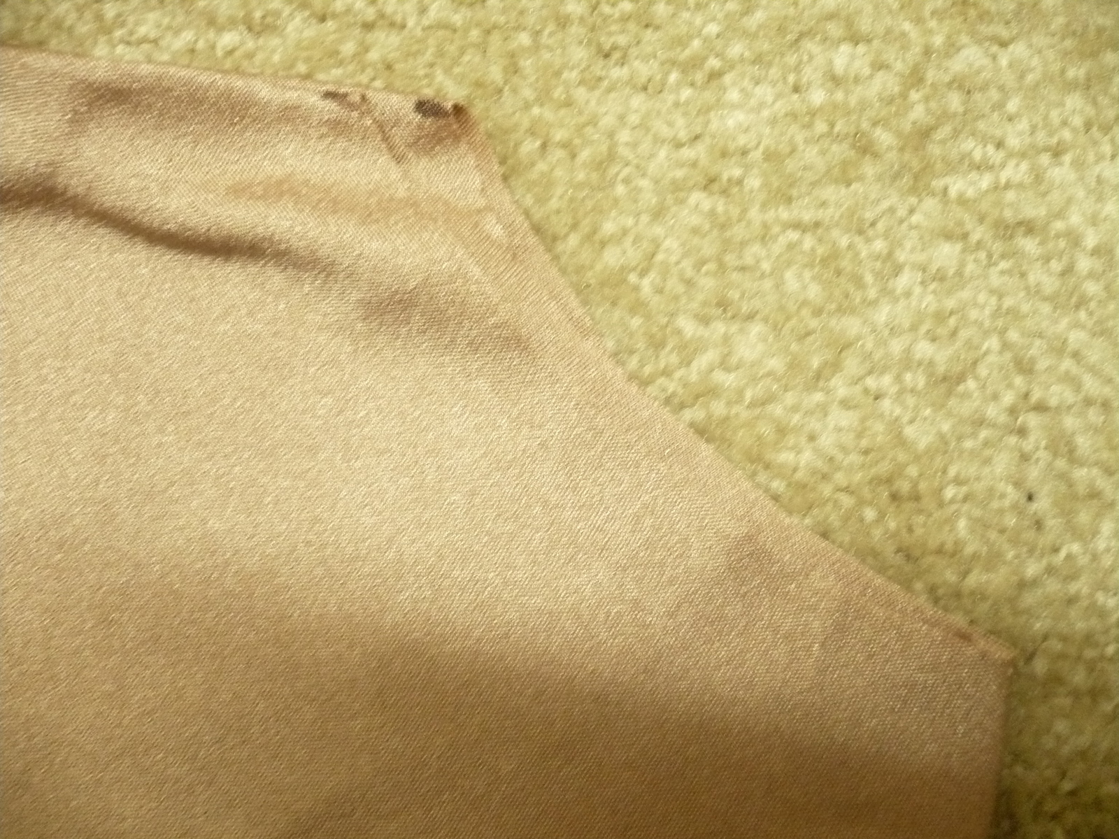 Now cut it on the fold. Make some small marking where the shoulders of