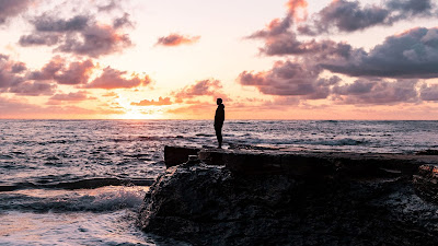 Lonely man, silhouette, rock, sea, sunset Lonely man, silhouette, rock, sea, sunset