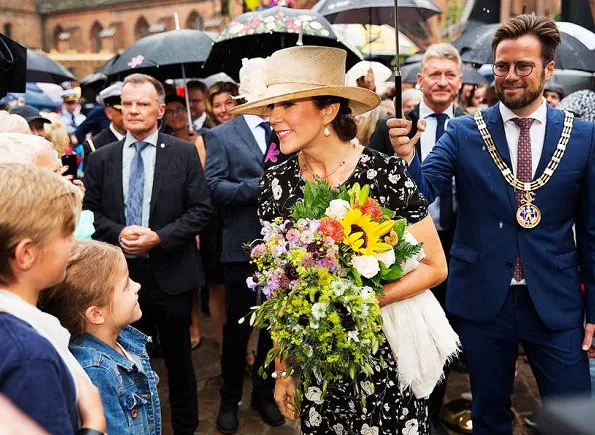 Crown Princess Mary wore a black and white floral dress by Ralph Lauren and Marianne Dulong pearl earring, Gianvito Rossi pumps