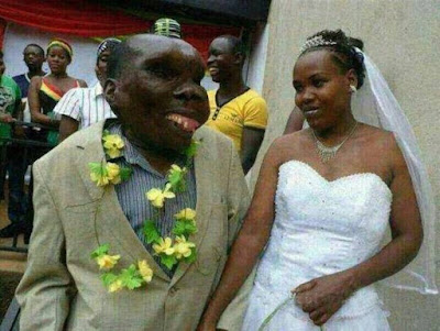 Ugliest man in Uganda Godfrey Baguma on his wedding day with his beautiful wife