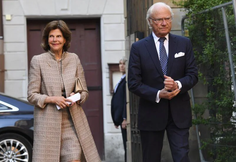 Queen Silvia wore a brown coat and dress from Newhouse Halifax at the Stockholm Early Music Festival 2021