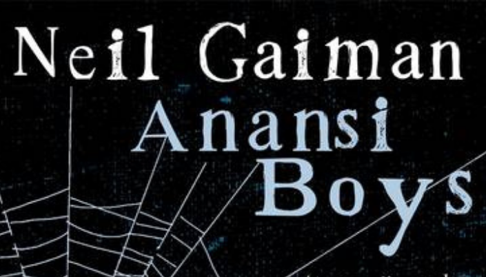 Imagem: fundo preto com uma ilustração de teia-de-aranha e o título em azul e numa letra gótica que poderia ter sido feita a giz: Anansi Boys e por cima o nome Neil Gaiman.