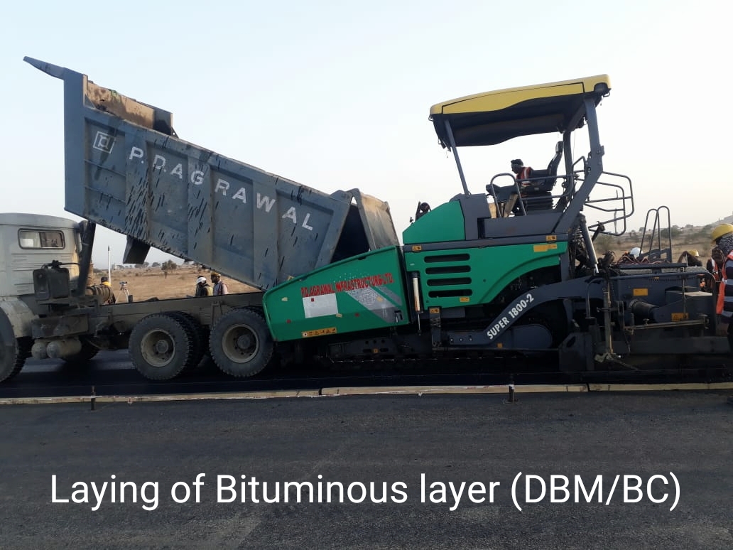 Dense Bituminous Macadam (DBM) or Bituminous Concrete (BC) layer