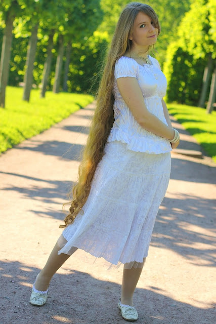 Portrait of the beautiful woman with long hair