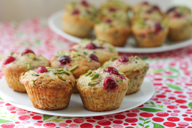Food Lust People Love: Cranberry pistachio muffins are great on their own for breakfast or teatime, or as part of your holiday buffet table. They aren’t just pretty, they are delicious as well! Maybe you’ve got some whole berry cranberry sauce of the jellied kind left over from Christmas. If so, these cranberry pistachio muffins make perfect use of that abundance. If not, buy a can on sale and bake these babies for your New Year’s Day breakfast. I used the one from Ocean Spray (link in the post.)