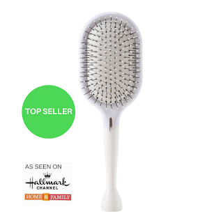 Smooth Hair results with the Gloss & Toss Detangler hairbrush