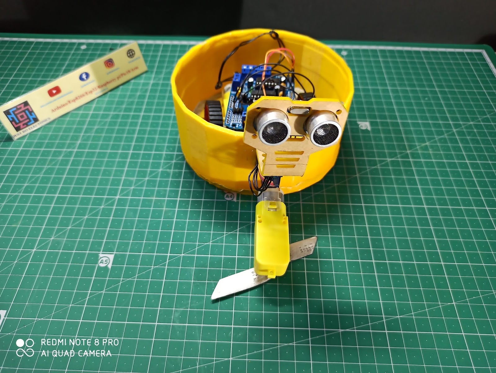Make an Automatic Grass Cutting Robot using Arduino