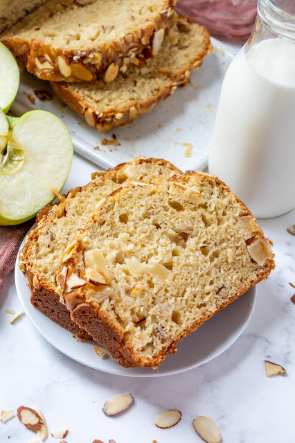 This delicious fall bread is packed with chunks of apples and topped with a delicious, buttery caramel almond mixture! Try it for breakfast, snack or dessert and enjoy every last bite!
