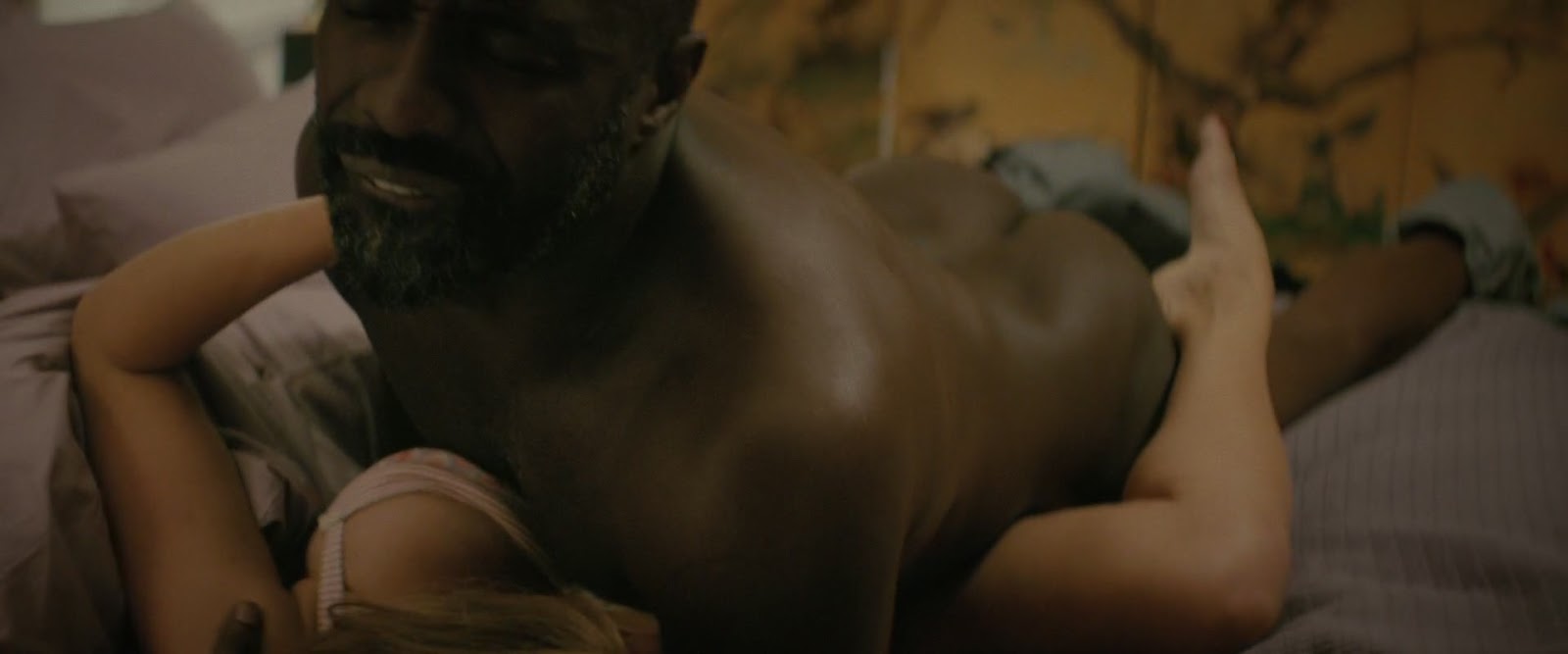 His Butt: Idris Elba in '100 Streets' .