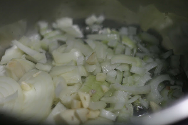 sauteeing the onions and garlic