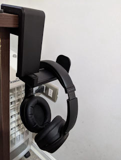 Storing classroom headphones at student desks