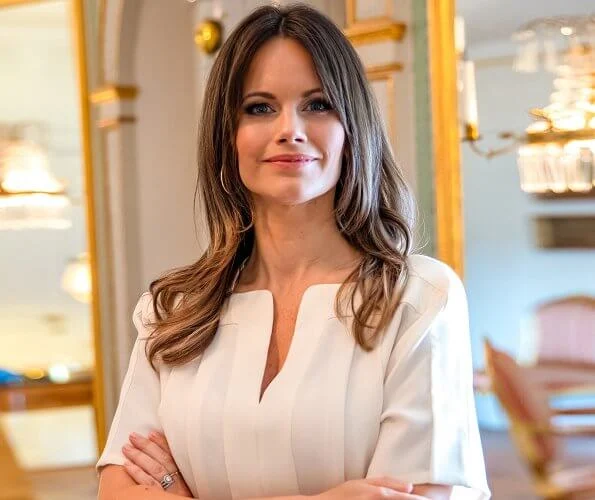 Princess Sofia wore an allie pleated  silk top from Viktoria Chan, and gold diamond nature ring from Ole Lynggaard Copenhagen. Princess Madeleine