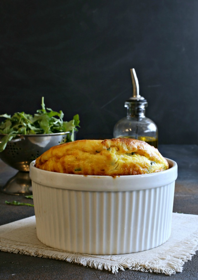 Recipe for a souffle using whole, not separated eggs, and flavored with smoked Gouda cheese.