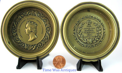 https://timewasantiques.net/collections/queen-victoria/products/queen-victoria-death-of-albert-1861-memorial-pair-of-brass-dishes-mourning