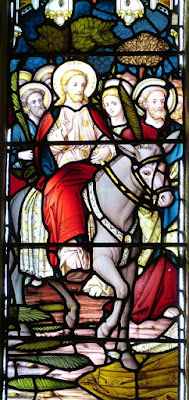 Stained glass window - Jesus rides into Jerusalem