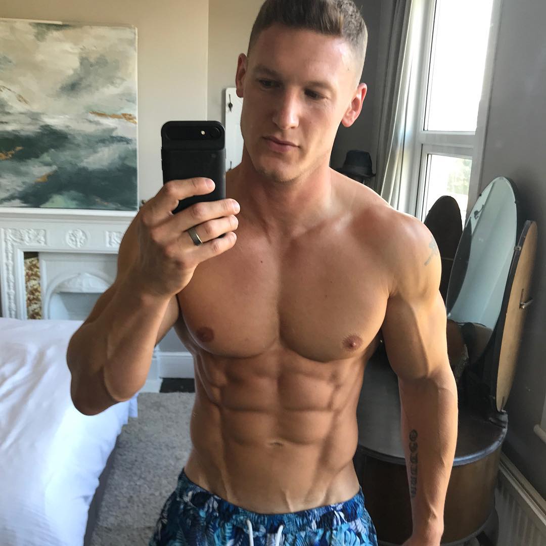 strong-shirtless-man-muscular-huge-pecs-abs-selfie