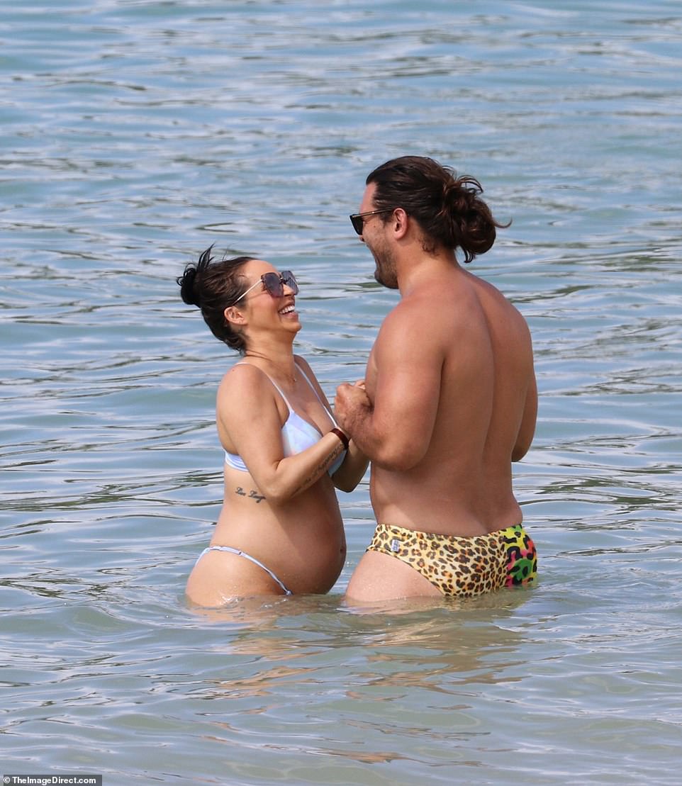 Pregnant Scheana Shay shows off her baby bump in a bikini. 