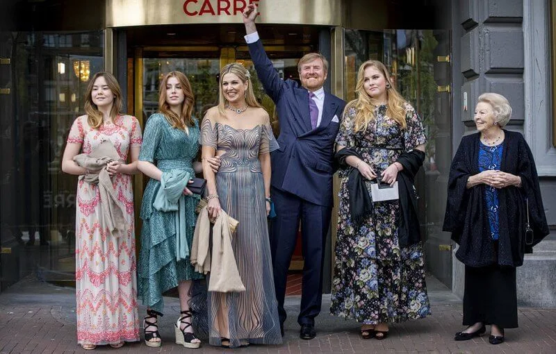 Princess Amalia and Princess Ariane in maxi dress by Needle & Thread, Princess Alexia in green dress by Maje, Maxima in blue dress by Iris van Herpen