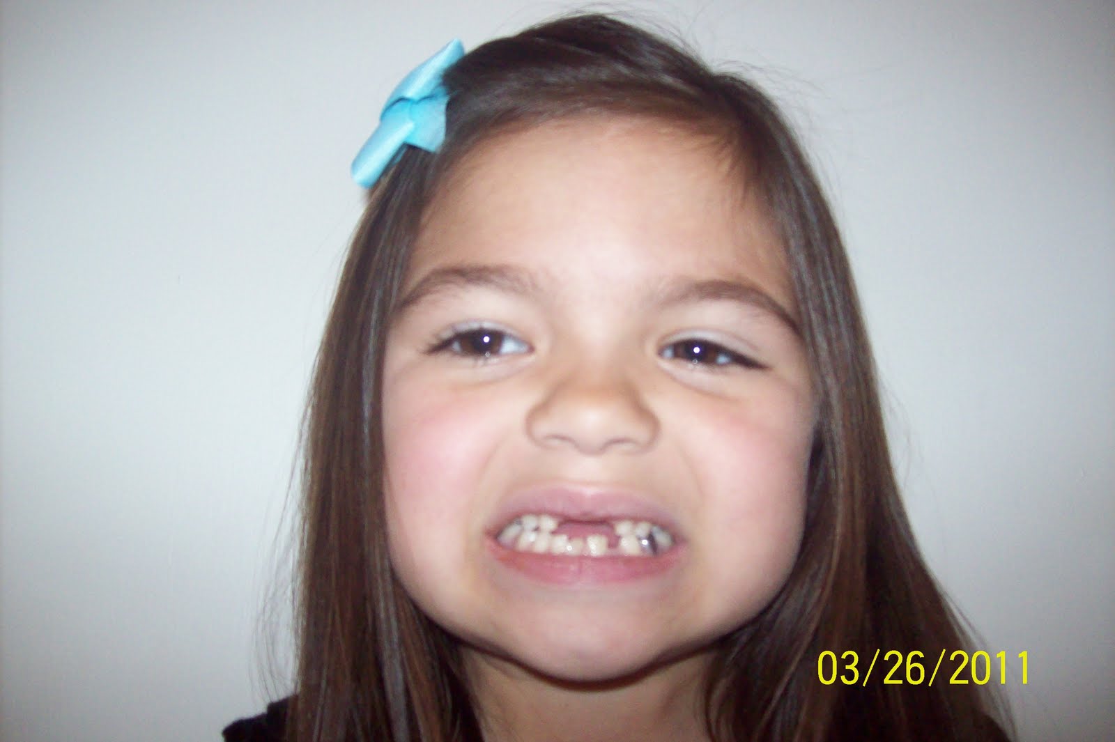 The Sanchez family Two front teeth, Hockey game, and yellow nails!!!