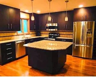 Kitchen with large granite top island.