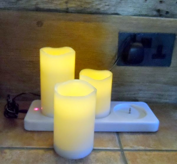 Ollie Stone Illustration by Ollie Stone LED rechargeable wax candles.