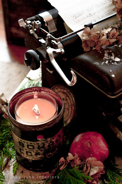 Candle in vintage coffee tin, with old typewriter decked out for Christmas, by Funky Junk Interiors