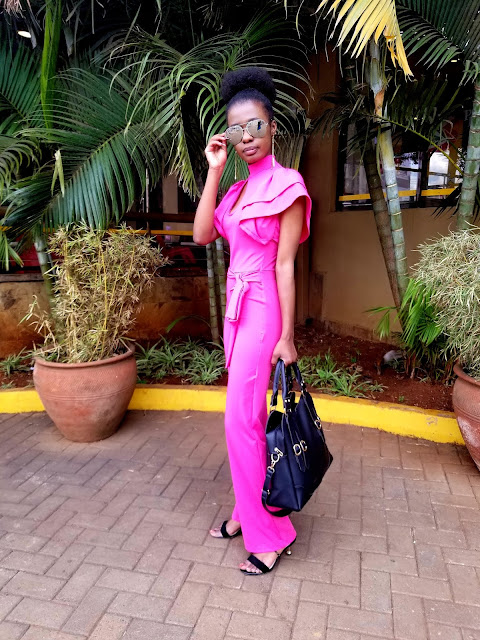 How To Pull Of A Jumpsuit That's Bright Pink