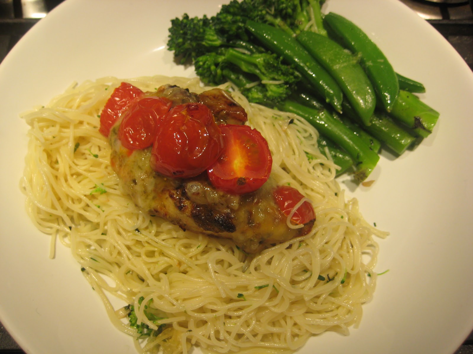 Lemon and Cheese Baked Pesto Chicken with Garlic Angel Hair Pasta