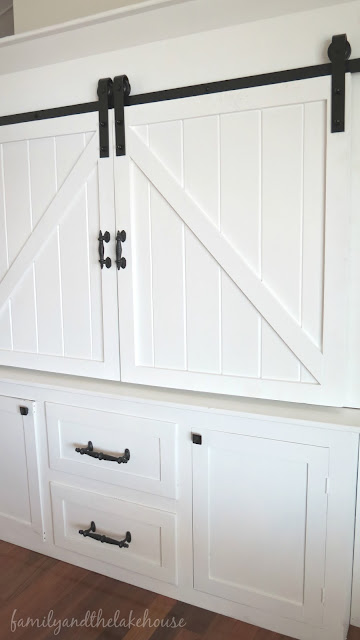 Sliding Barn Door White Entertainment Center Unit - Family and the Lake House - www.familyandthelakehouse.com