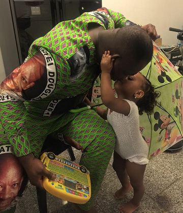 2-year-old girl kissing