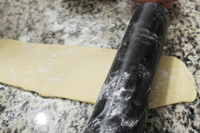 Roll the dough into a long rectangle
