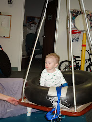 cooper greyson jewell enjoying fil chick lunch swing
